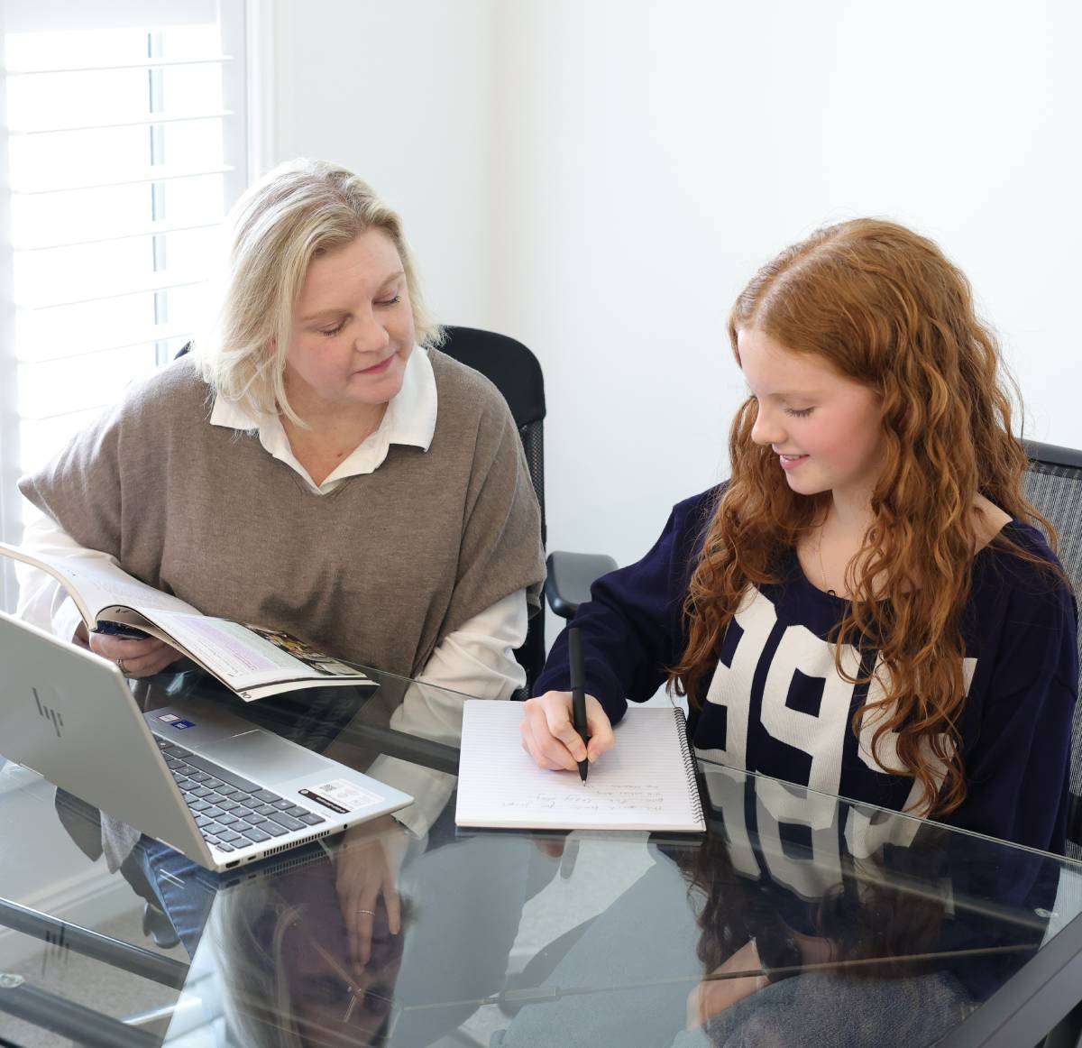 Tutor providing personalised guidance to help a student reach their full potential